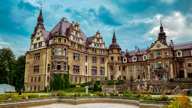 manor mansion with maroon roof