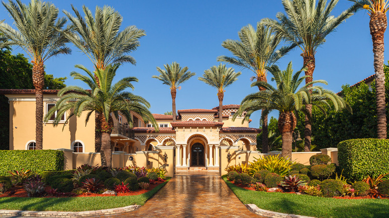 mansion in sun with garden