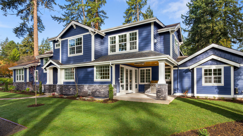 blue mansion with stone detail