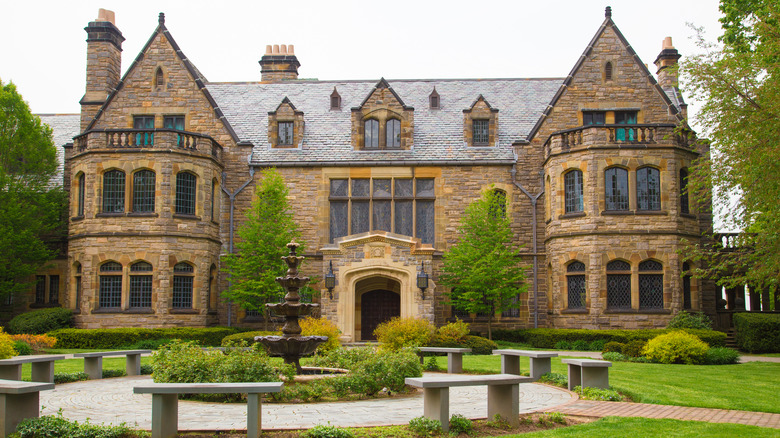 stone mansion with sitting area