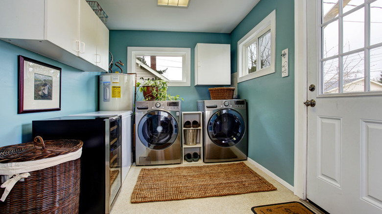 modern teal laundry room 