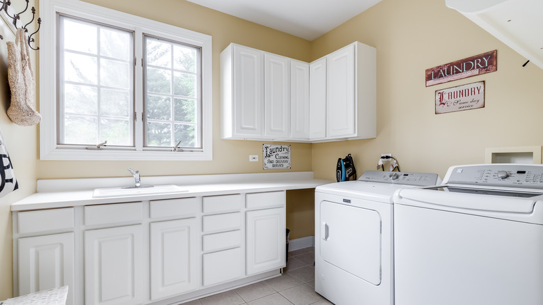 white cabinets laundry room 