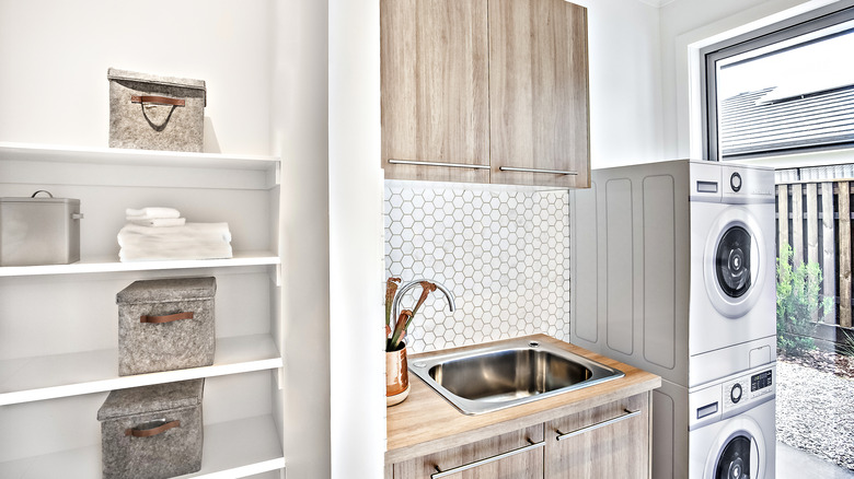 laundry room with beautiful tiles 