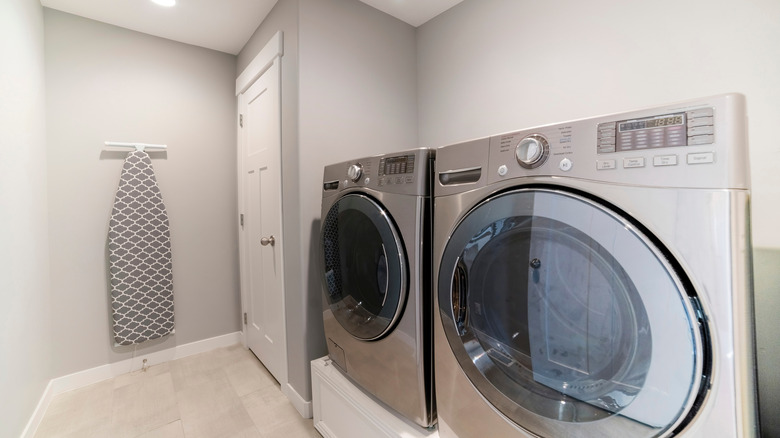 laundry room with closet 