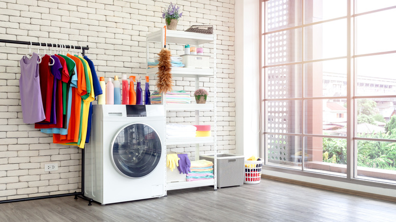 laundry room with large windows 