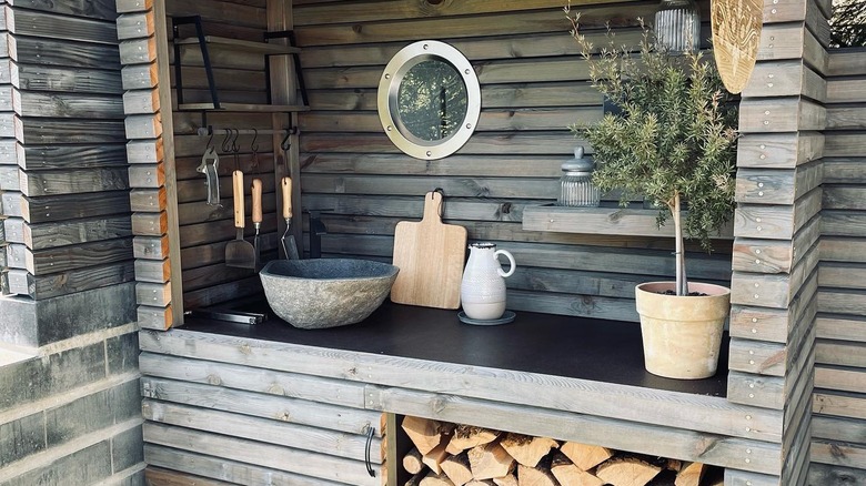 Aged, ashy wood outdoor kitchen