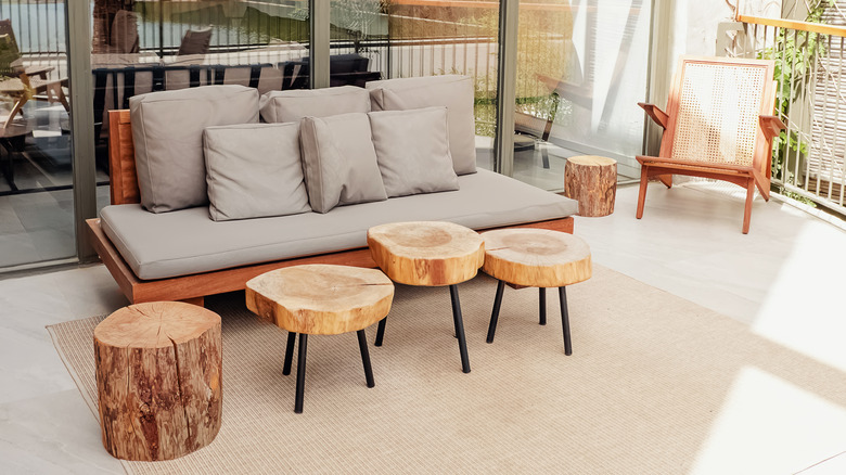 gray couch and wooden tables