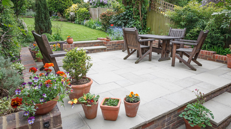 paved patio with dining set