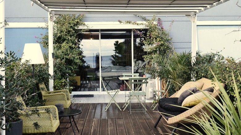 patio with plants and furniture