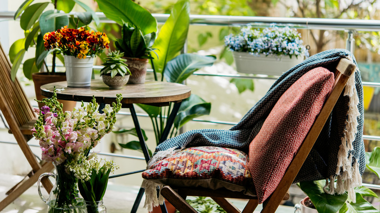 balcony with plants and furniture