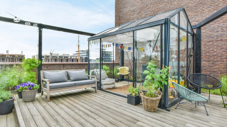 rooftop patio with greenhouse gazebo