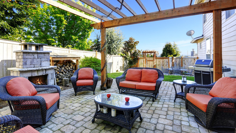 patio with stone fireplace