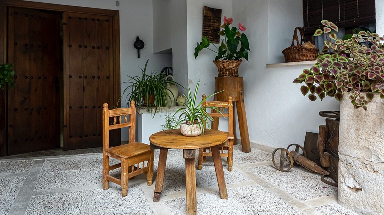 patio with vintage wood furniture