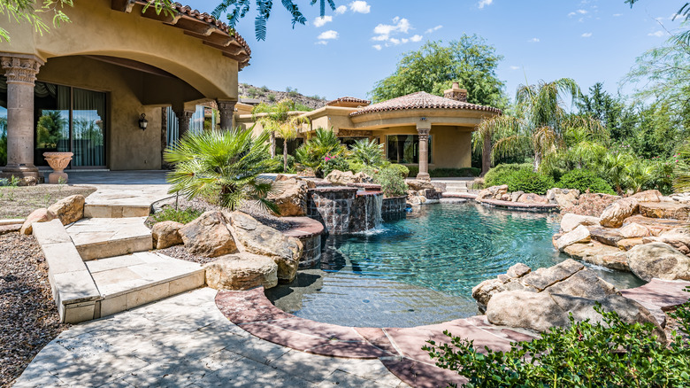 large rocks around a pool