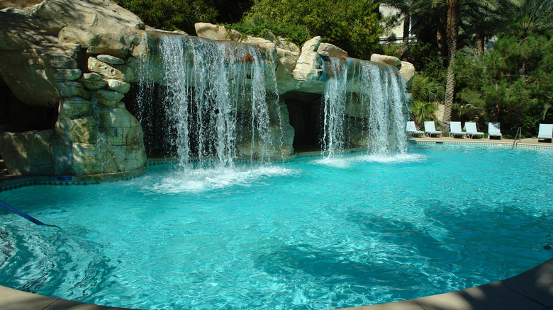 pool with waterfall and cave