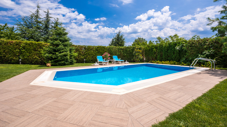 pentagon-shaped pool in a backyard