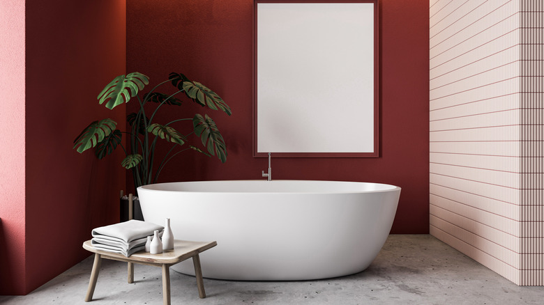 Dark red walls zen bathroom