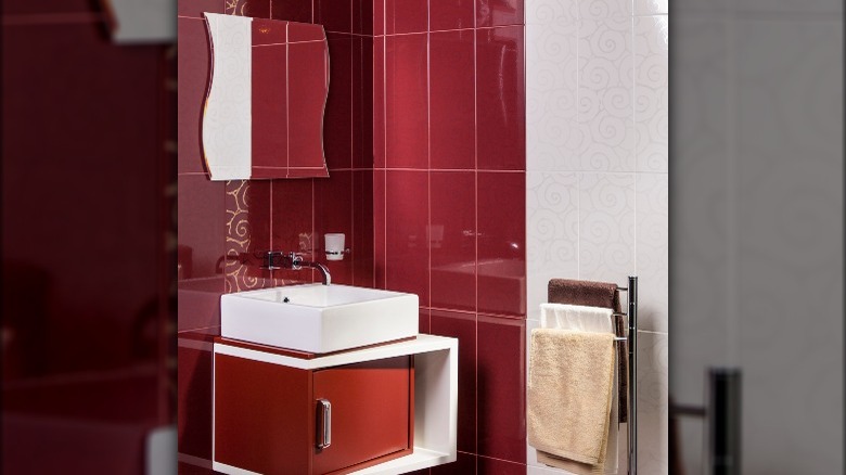 Dark red glossy wall tiles