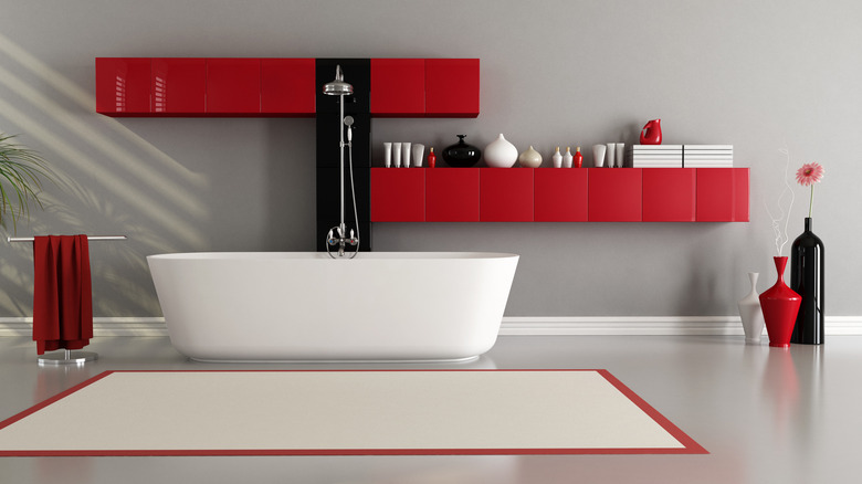 Red shelves in bathroom