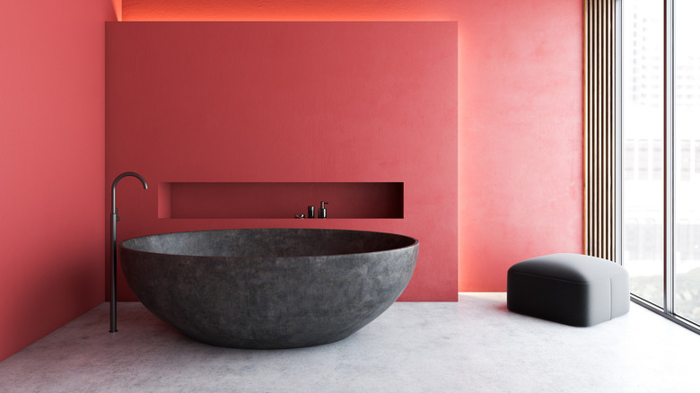 Red bathroom large black tub