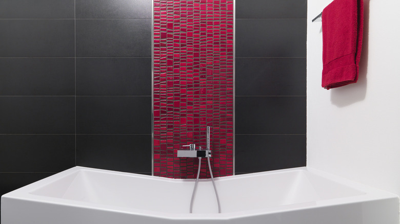 Red tile accent black walls