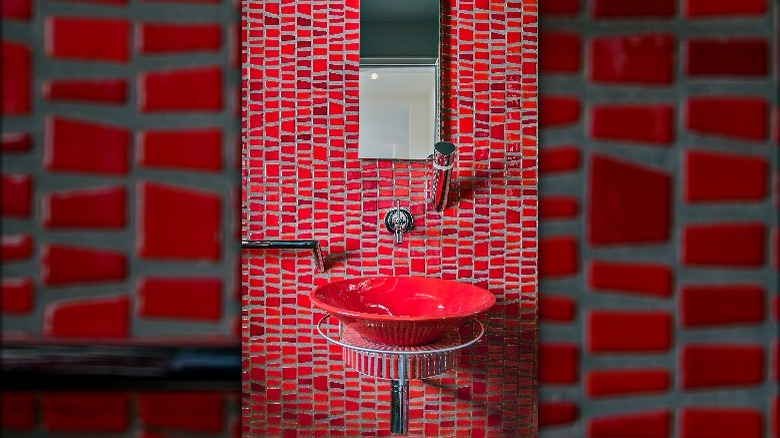 Red tile wall and sink