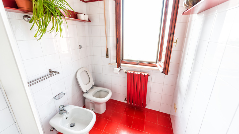 Bright red bathroom floor tiles