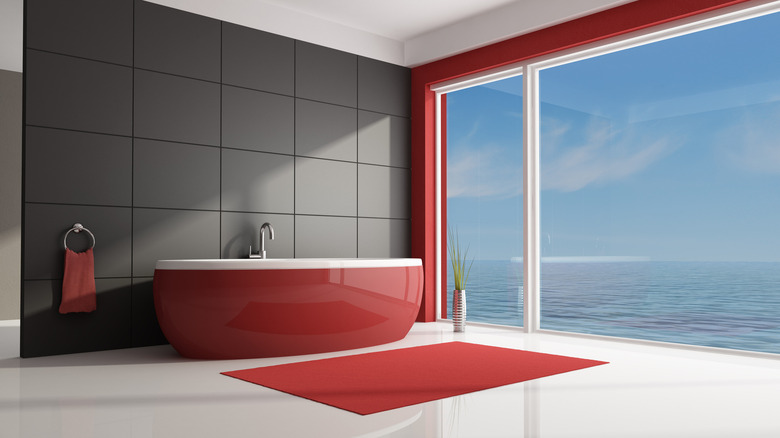 Scarlet red bathtub gray walls