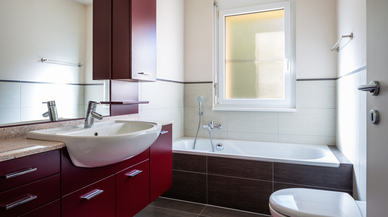 Wine red bathroom cabinets