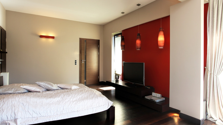 bedroom with red wall 