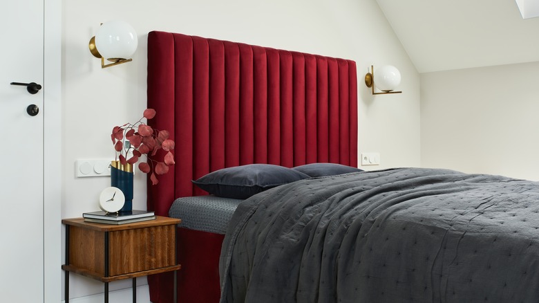 dark red headboard in bedroom