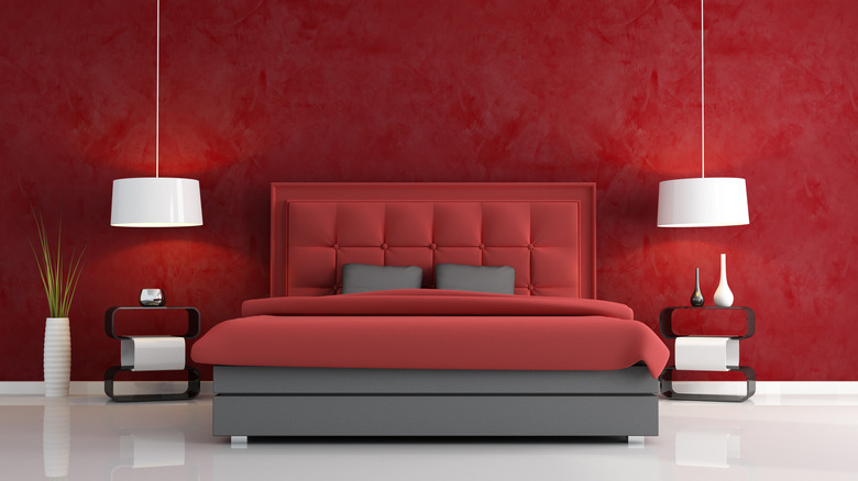 red wall and bedframe