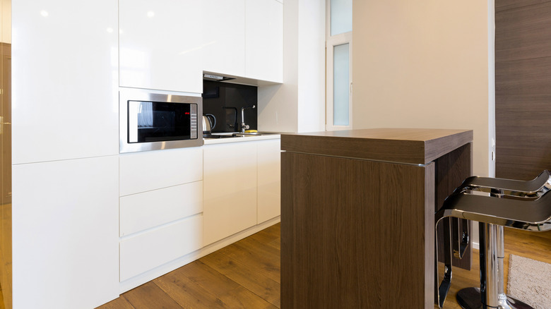 Small white and brown kitchen