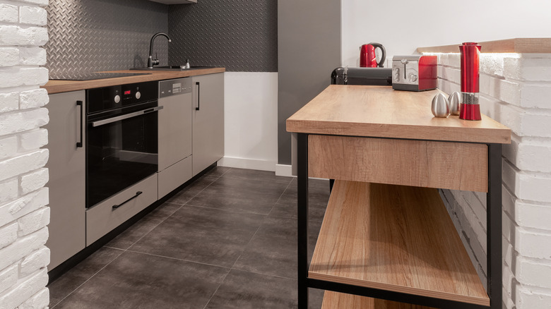 Gray red and tan kitchen