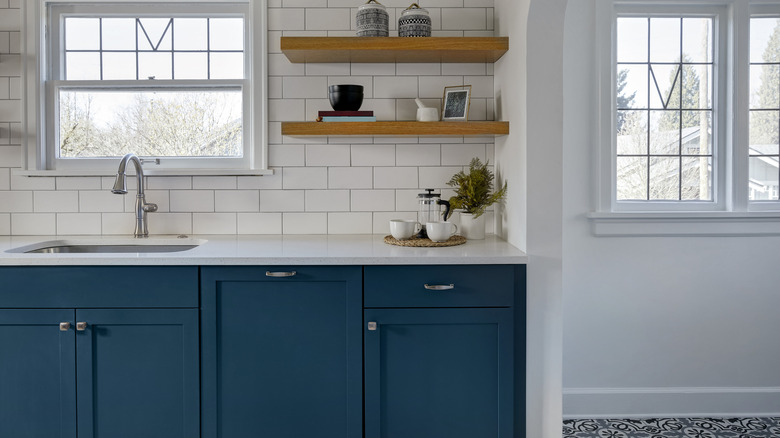 Kitchen with blue cabinets