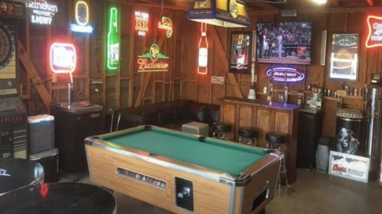 A pool table and neon lights