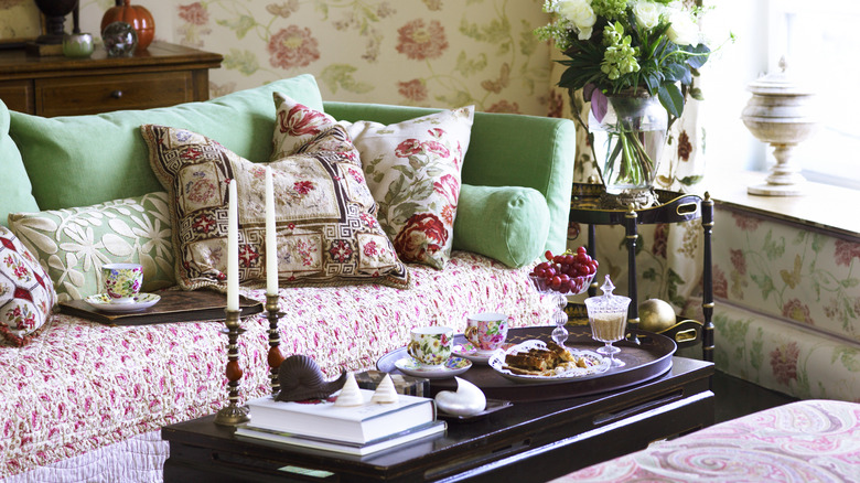 Living room with mismatched fabrics and countless accessories