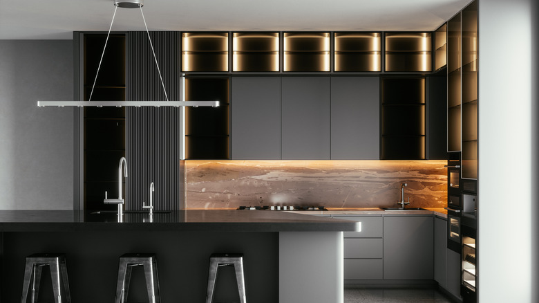 Industrial-looking kitchen with gray cabinetry