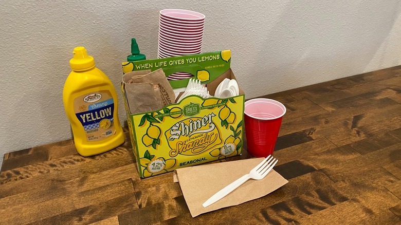 Beer box with picnic utensils