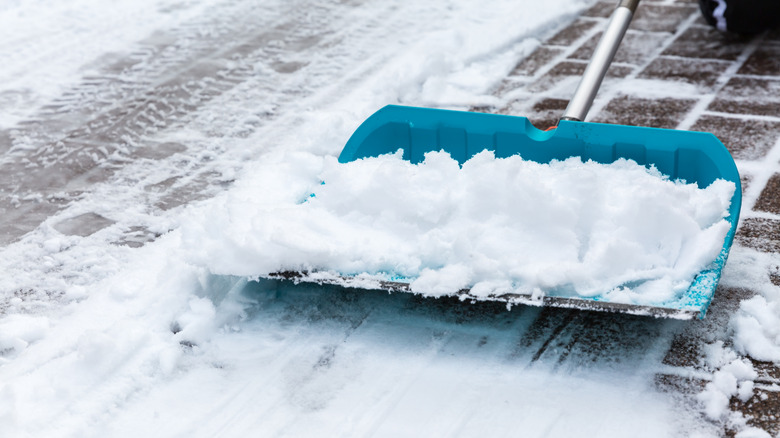 Person shoveling snow