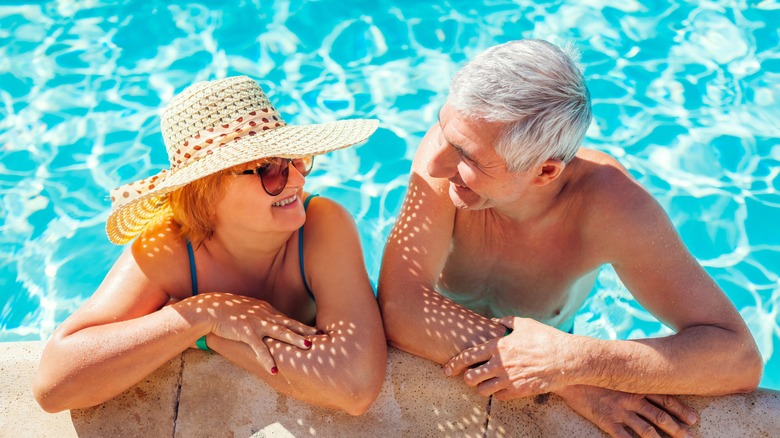 couple enjoying a pool