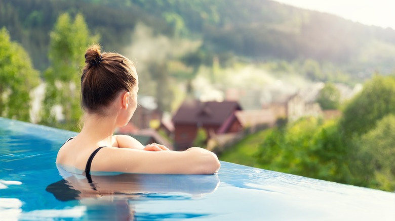 woman enjoying the pool view