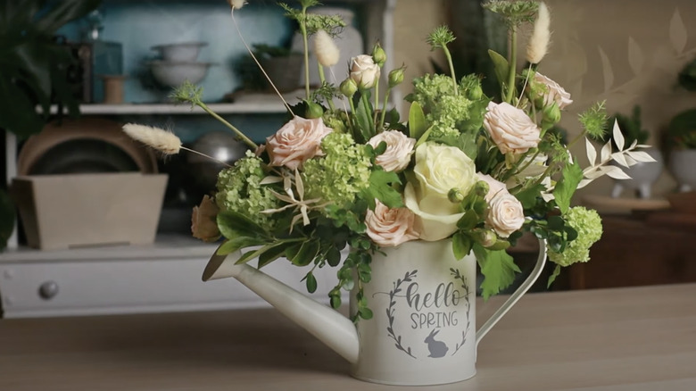 Watering can floral arrangement