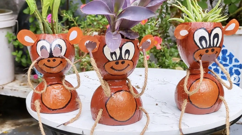 Garden art made with coconut shells