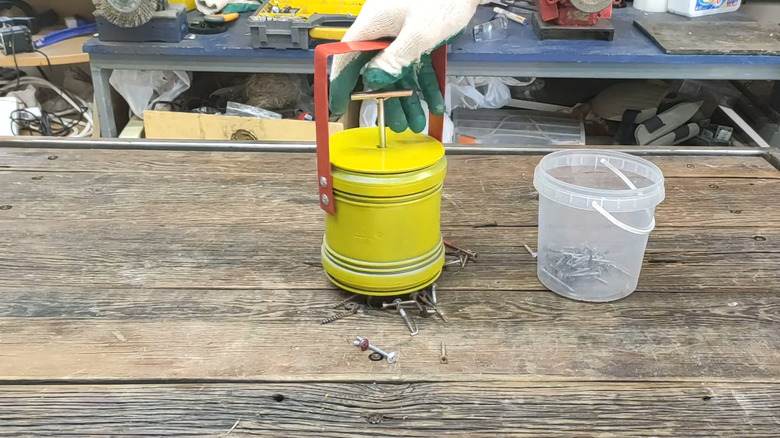 A magnetic screw and nail collector made from old speaker magnet