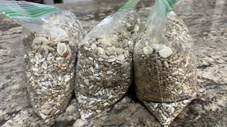 Three bags of bird seed