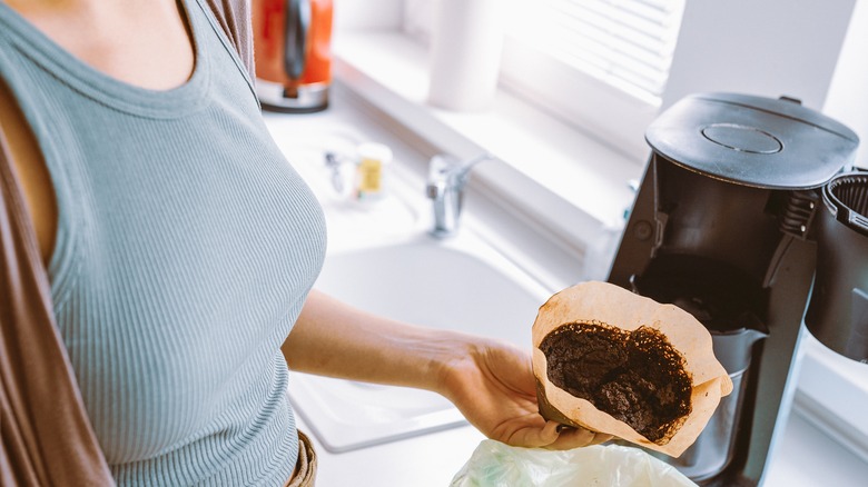 Collecting used coffee grounds