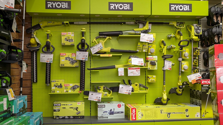 A wall of Ryobi tools