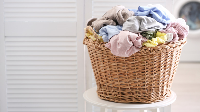 Laundry basket filled with clothes