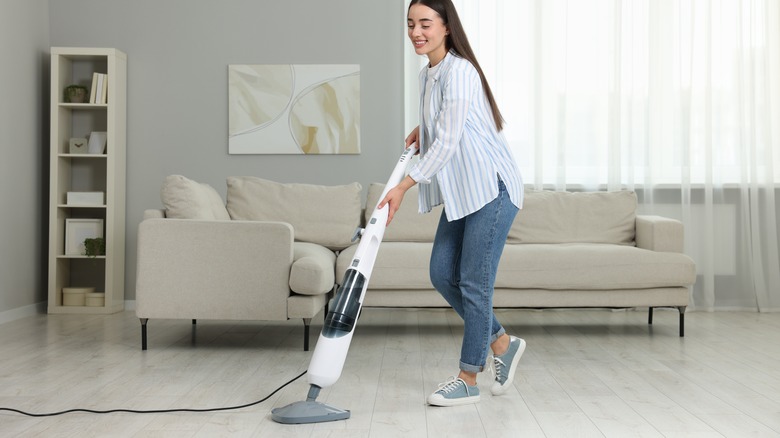 woman cleaning with steam mop